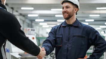 RF engineers shaking hands