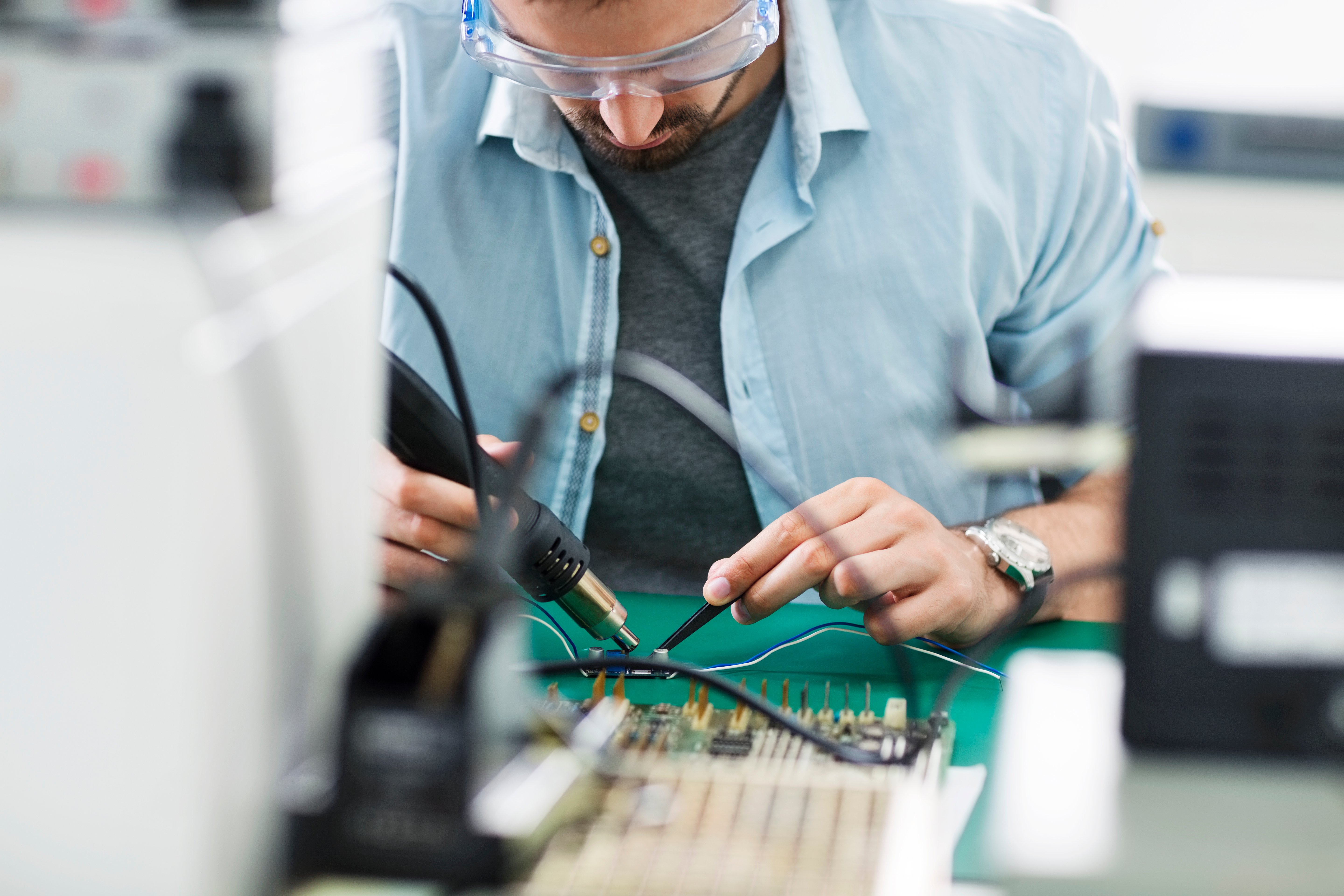 RF engineer working on a PCB
